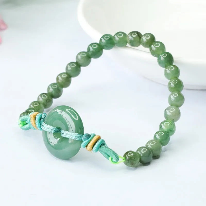 Emerald green jade bracelet with Chinese safety buckle and star-shaped 6mm beads.