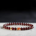 Wine red glass bead garnet bracelet with new Chinese style design showing single circle configuration