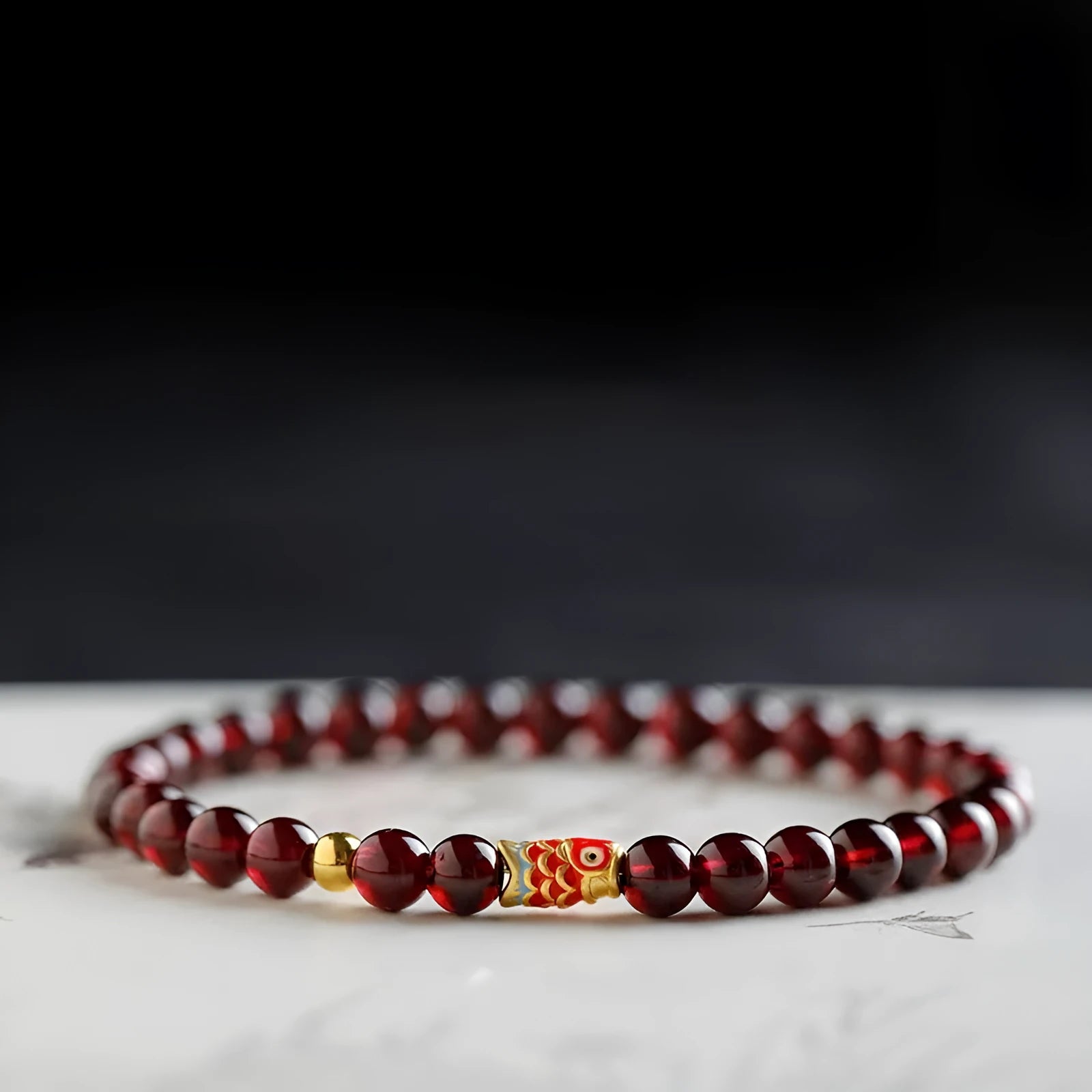 Wine red glass bead garnet bracelet with new Chinese style design showing single circle configuration