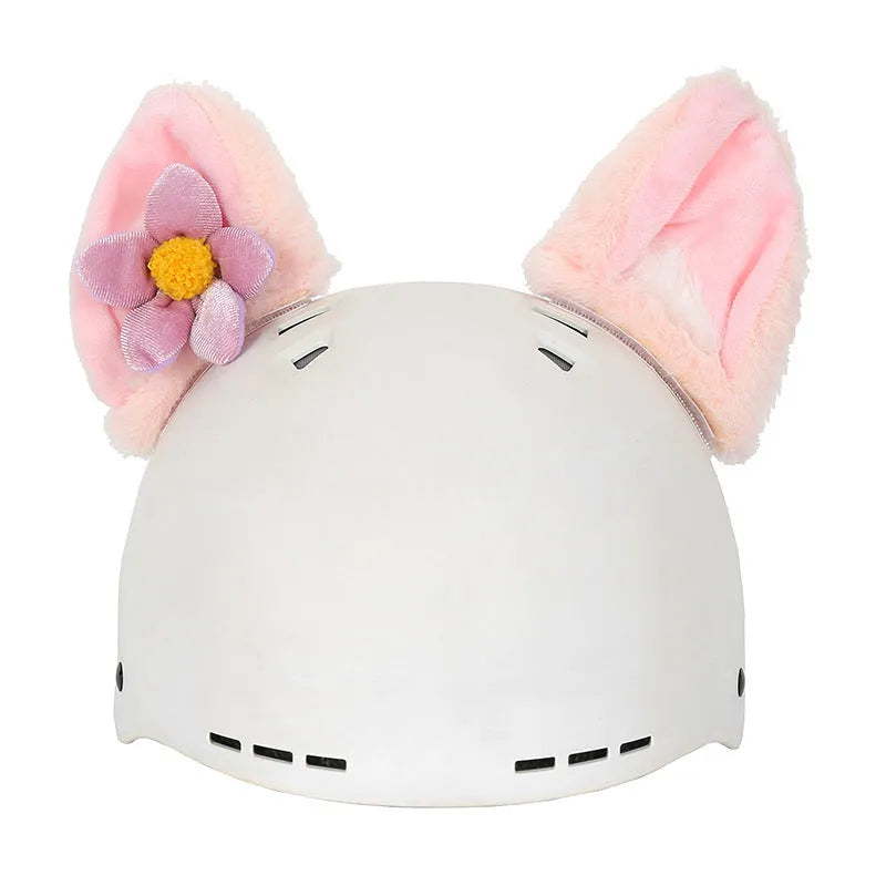 A soft plush cartoon character cover stretched over a medium-sized motorcycle helmet.