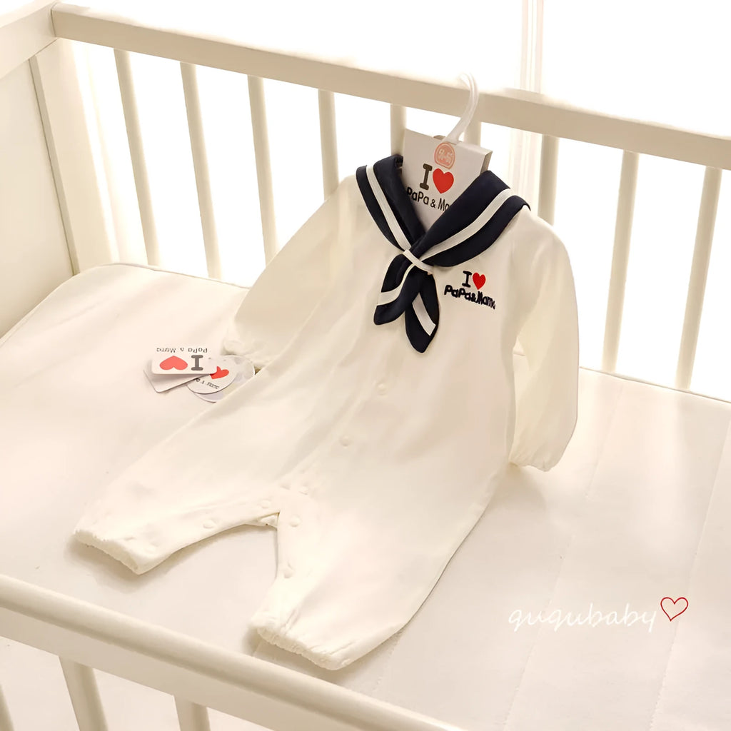 Navy style long-sleeved baby onesie with detachable hood and single-breasted snap closure.