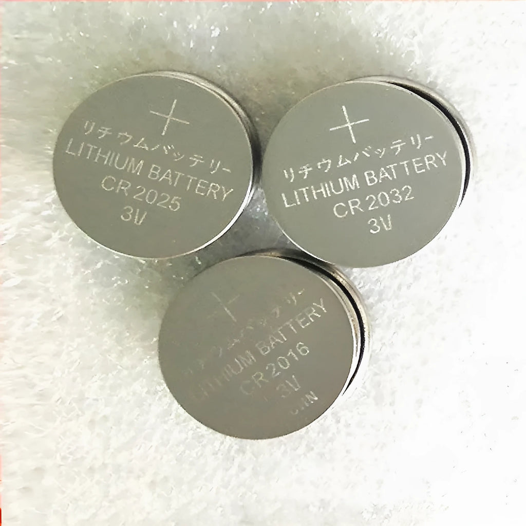 Pack of 3V alkaline button batteries showing CR2032, CR2025, and CR2016 coin cells for small electronics.