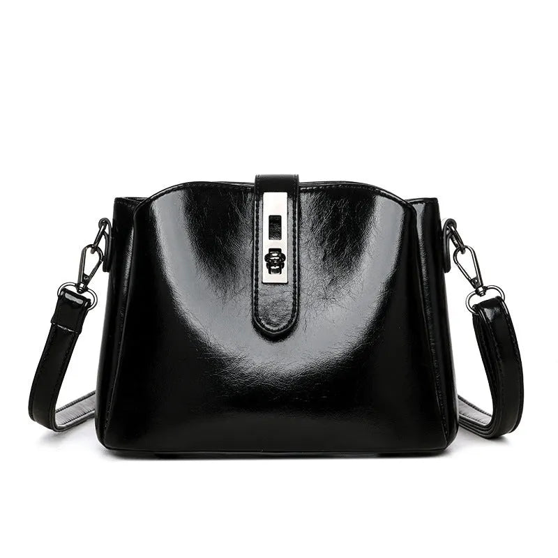 Women's retro fashion messenger bag in PU with sandwich pocket, available in black, brown, and white