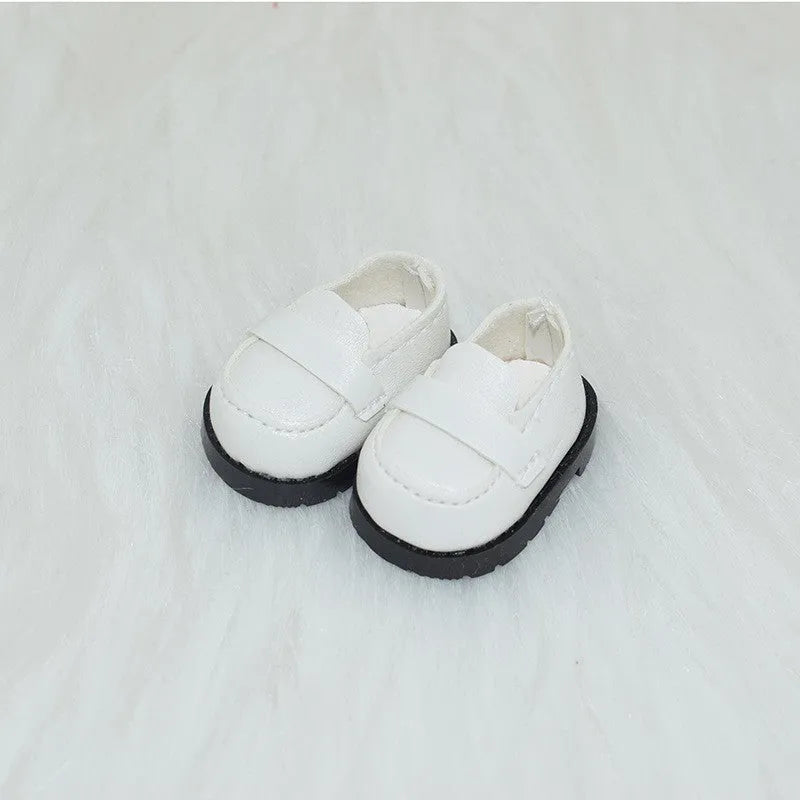 A pair of polyurethane doll shoe accessories for a 17cm figure, shown in a selected style and colour.