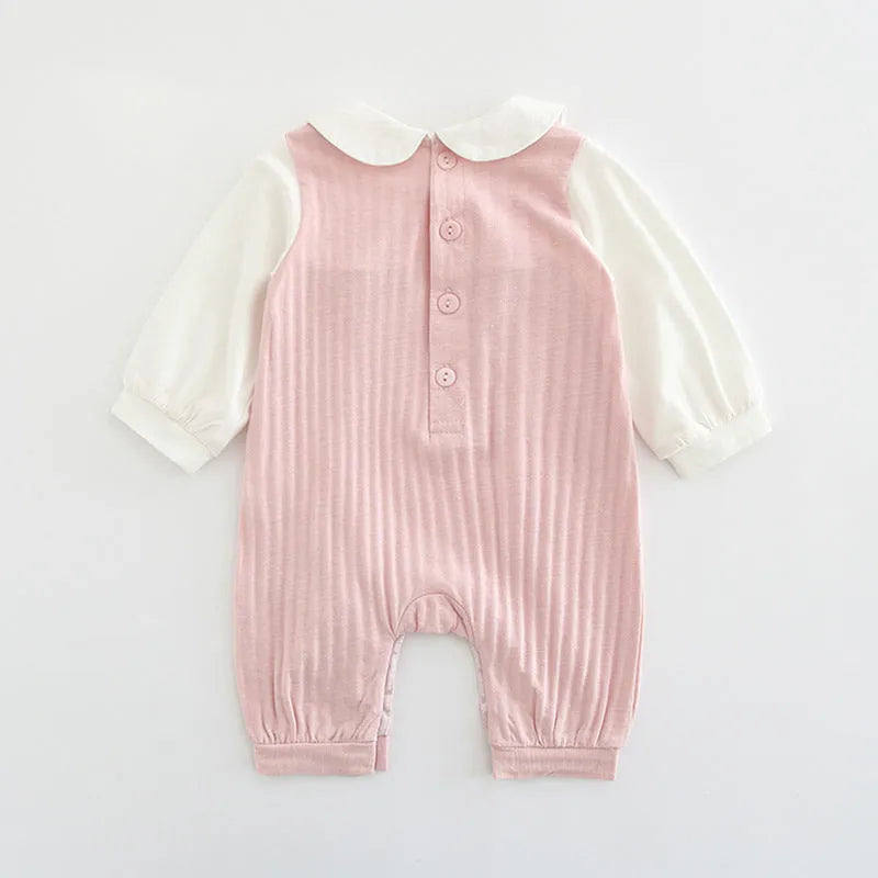 Pink baby girl embroidered long sleeve jumpsuit made from 100% cotton.