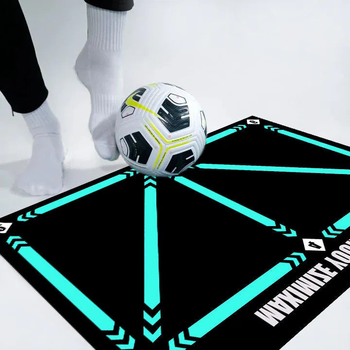 Black non-slip football training mat measuring 60cm by 90cm on a flat surface
