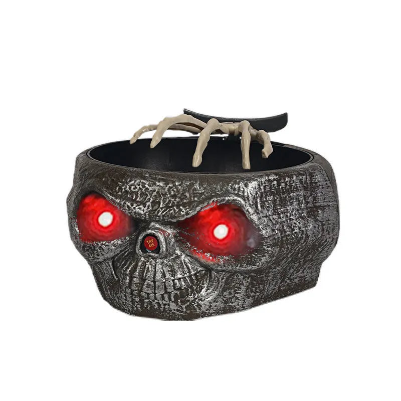 Motion activated Halloween candy bowl plastic pumpkin shape with skeleton hand and glowing red eyes