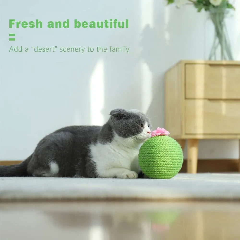 Green cactus-shaped cat tumbler scratcher with sisal ball on a tree tower