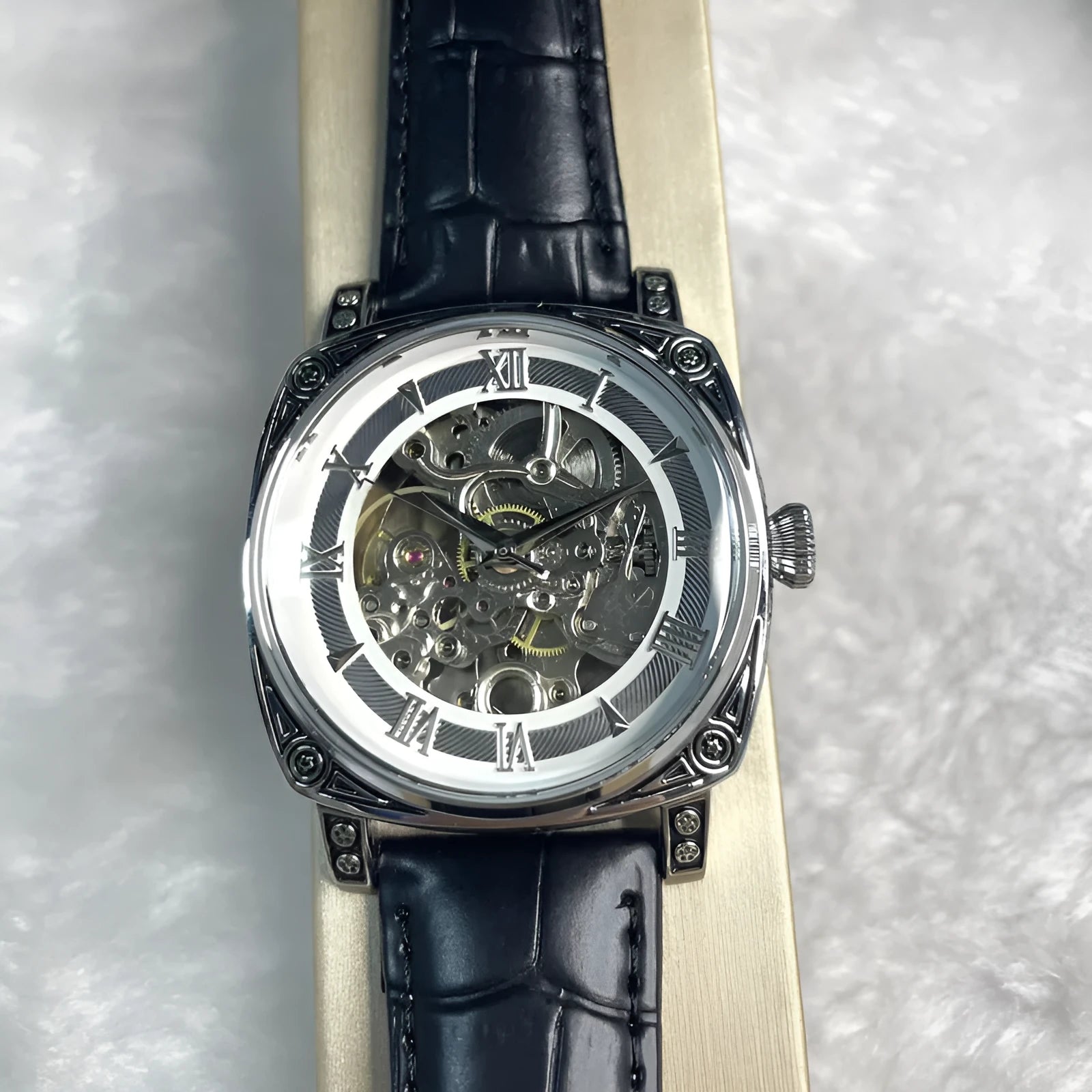 Mens hollow out business watch with white leather strap and round dial