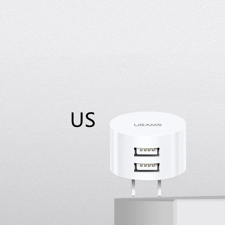 White portable universal dual USB phone charger with US EU UK plug compatibility and 39mm diameter