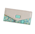 Women's black three-fold PU leather wallet with a buckle closure, shown open to display multiple card slots.