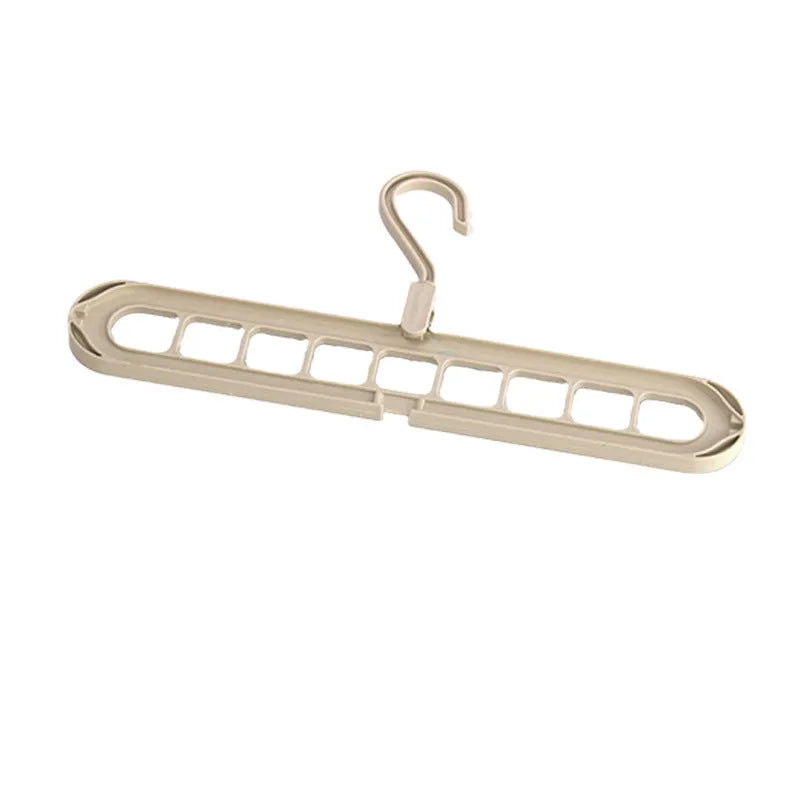 Plastic nine-hole trouser hanger in modern design with seamless folding rack construction
