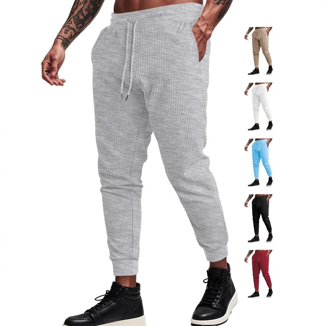 Men's casual loose solid colour waffle knit drawstring pants in khaki, front view, on white background