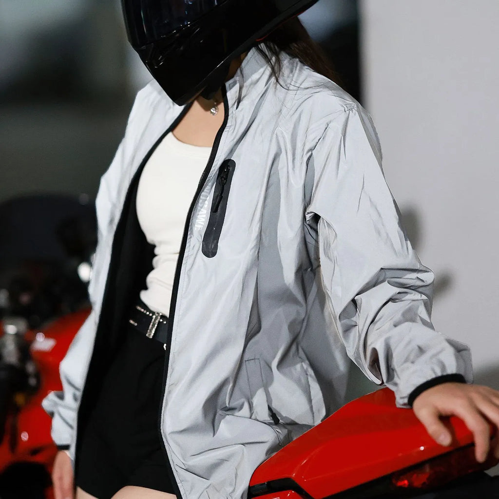 Silver waterproof polyester long sleeved windproof jacket for outdoor activities.