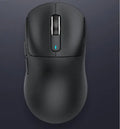 Black three-mode rechargeable Bluetooth mouse with USB receiver and parachute cord on a desk.