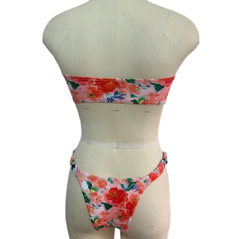 Women's polyester bikini set with floral print tube top and matching briefs for swimming.