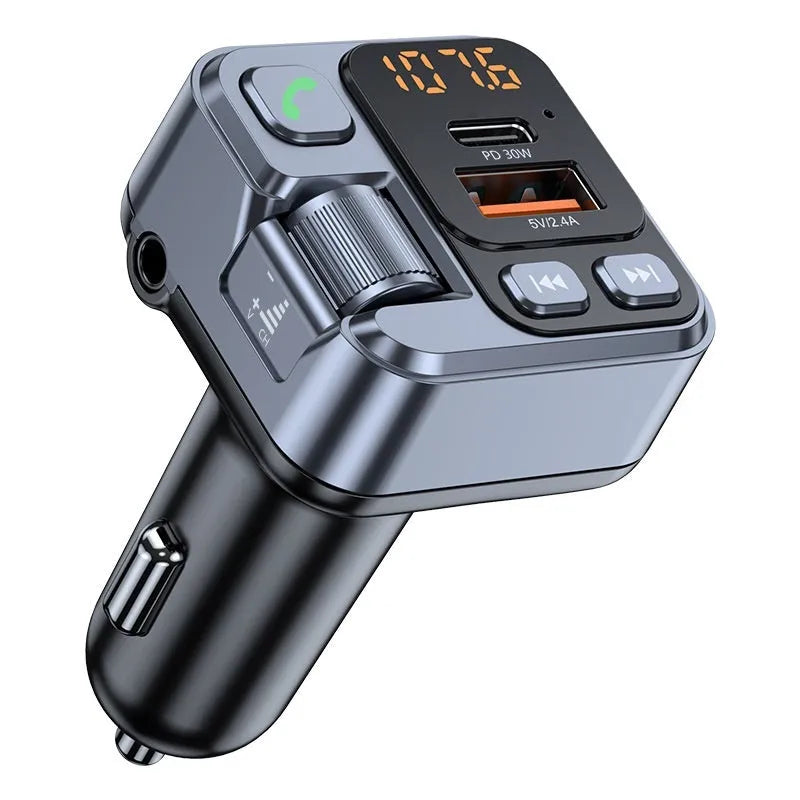 Bluetooth car MP3 player transmitter with dual USB charging ports and LED display plugged into a 12V car socket.