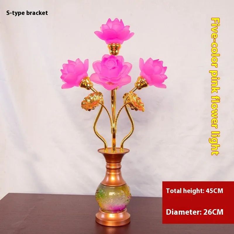 Coloured glaze pink and yellow LED lotus lantern for Buddha worship on an alloy stand.