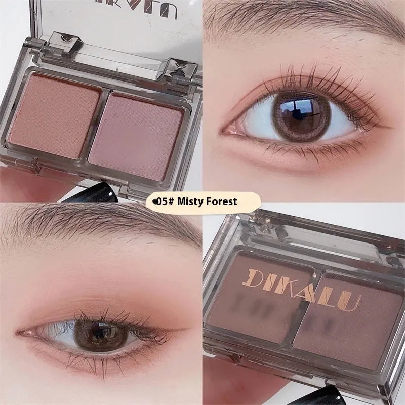 Cool two-tone eye shadow plate showing pink and black matte shimmer colours in a standard cosmetic compact.