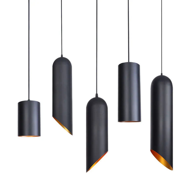 Matte black retro iron chandelier with multiple arms, shown against a neutral wall.