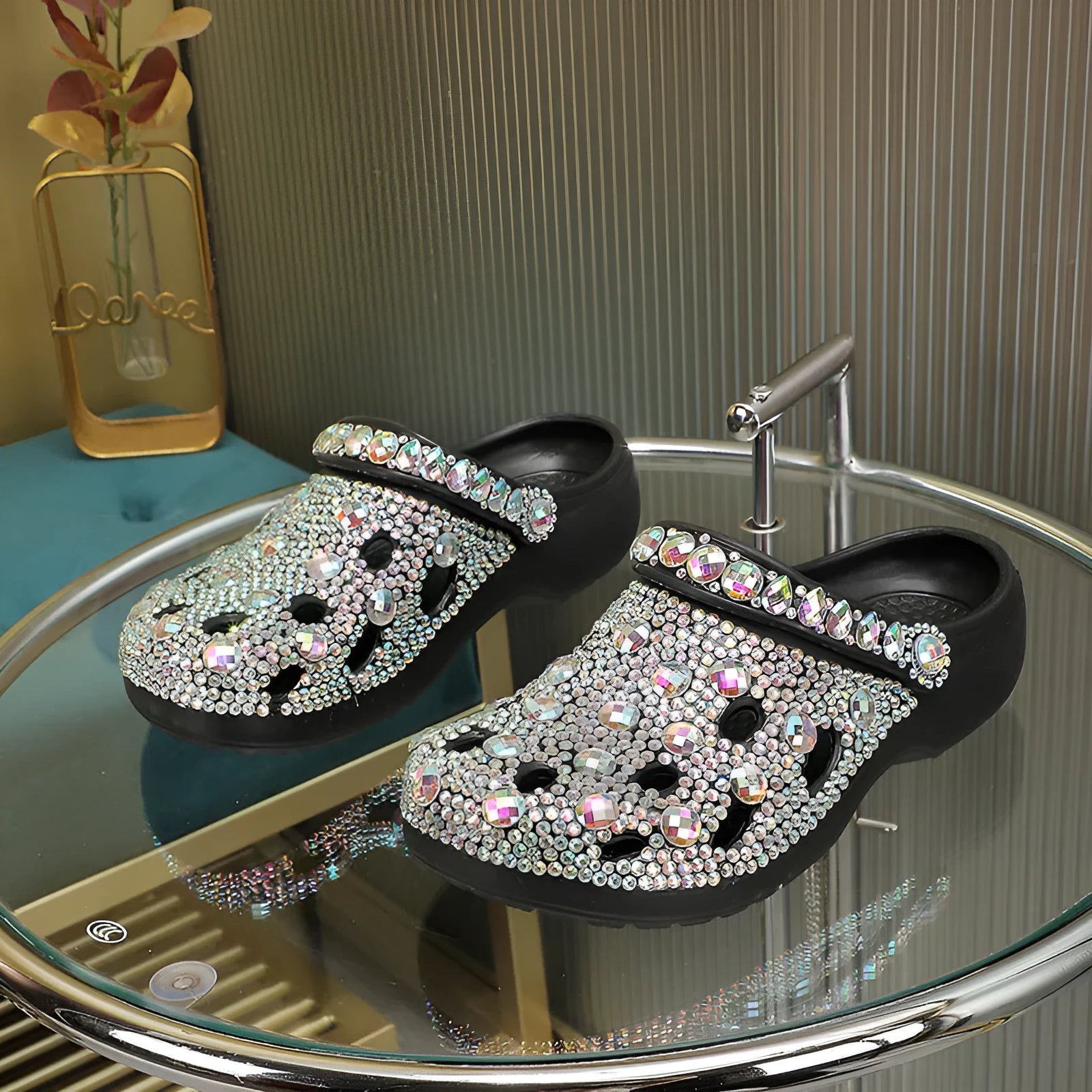 Black women's platform sandals with rhinestone detail on an EVA upper and a textured injection-moulded sole.