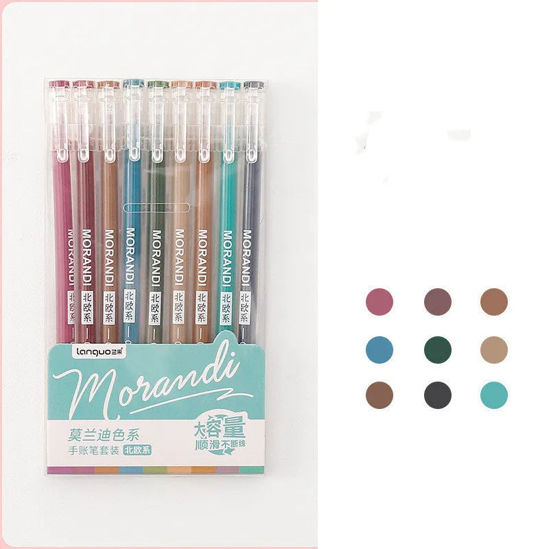 Set of nine colourful 0.5mm needle-tip gel pens with plastic shells arranged in a box.
