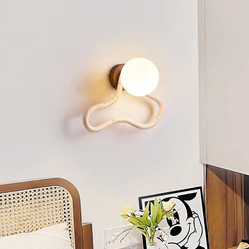 Cream coloured Middle Ancient style bedside wall lamp with travertine glass shade and wood base