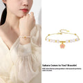 Women's pink bracelet with S925 silver cherry blossom pendant and Hetian jade beads