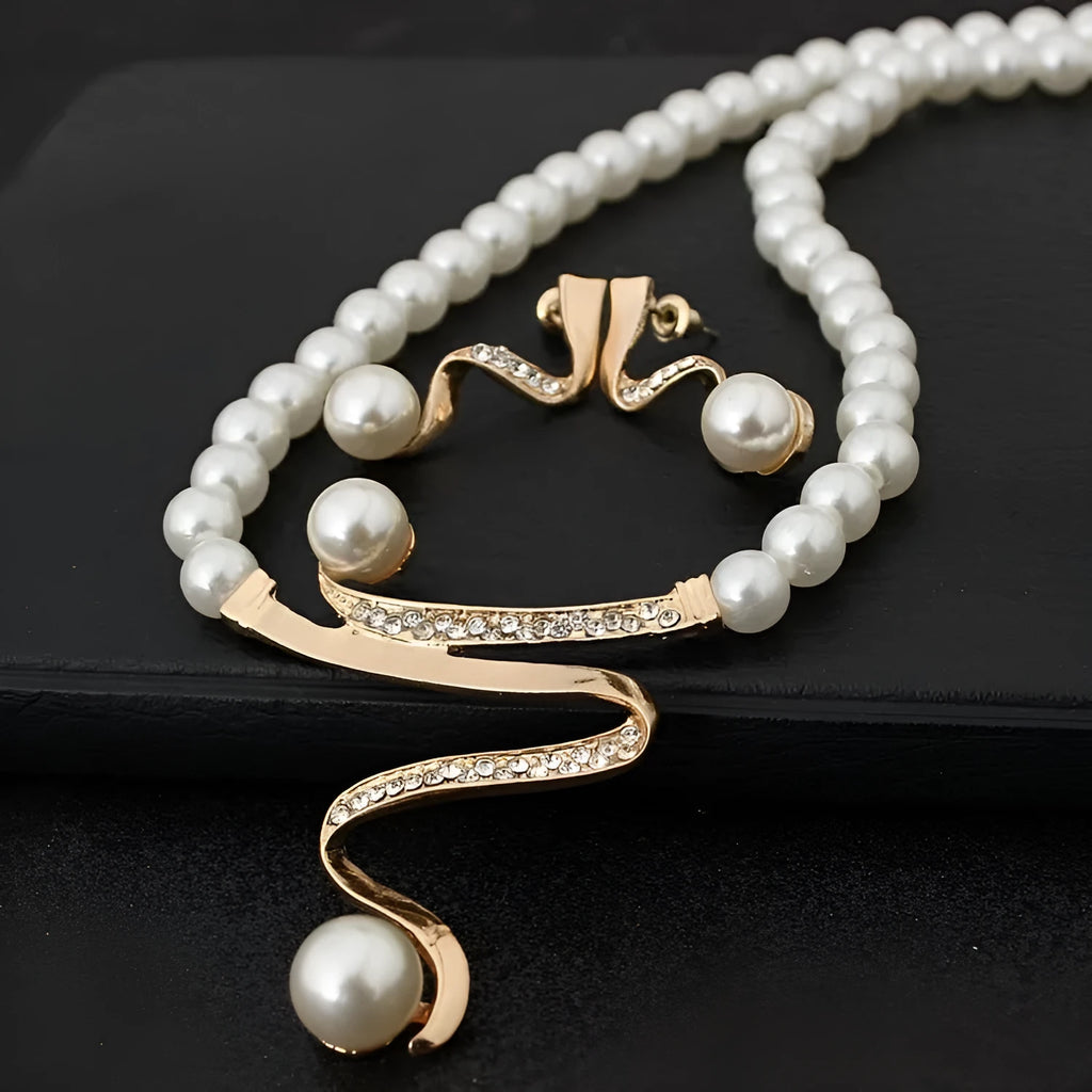 Gold electroplated pearl necklace and earrings set with deep V clavicle design and drop-shaped pendants