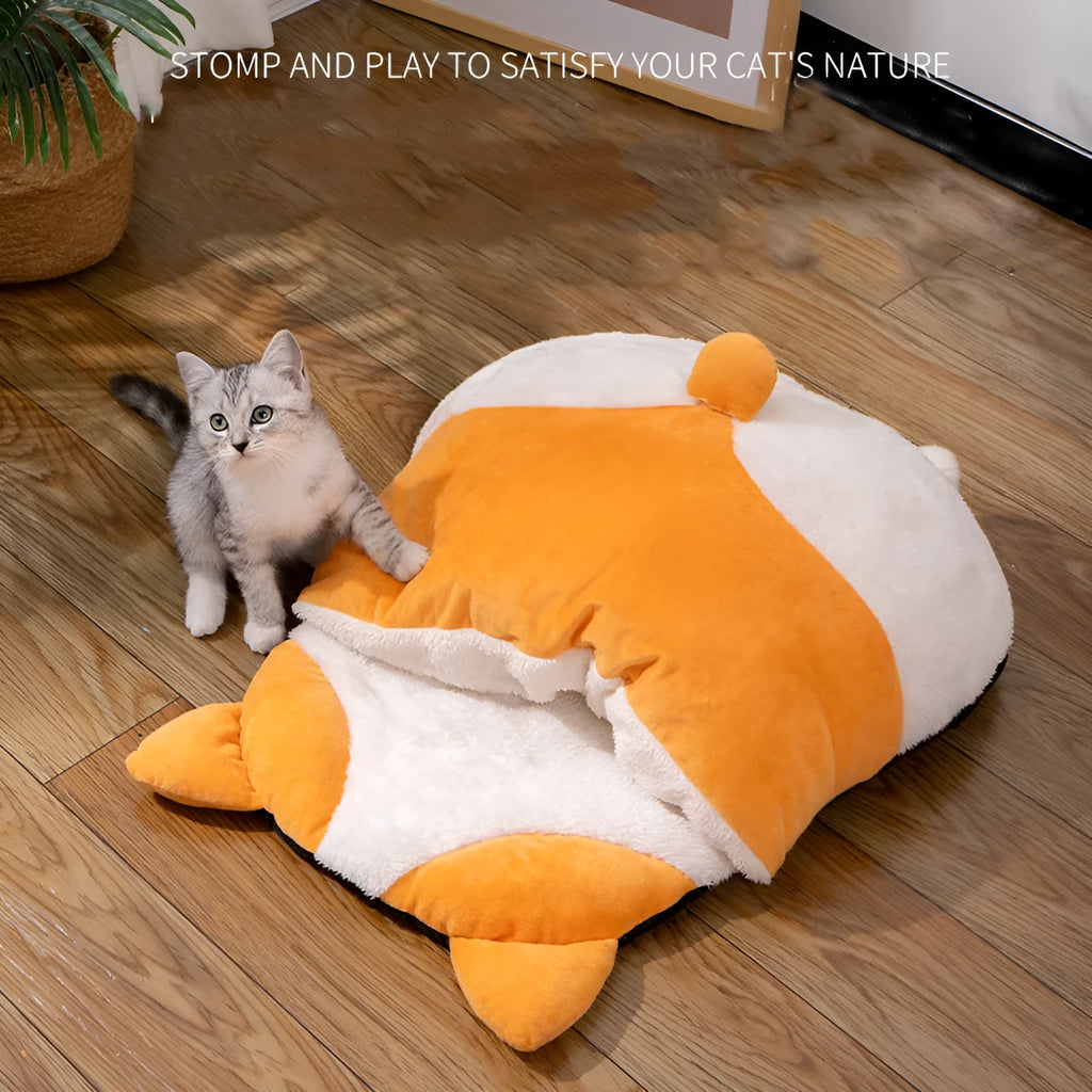 Orange semi-closed cat sleeping bag bed showing soft nest construction and raised edges.