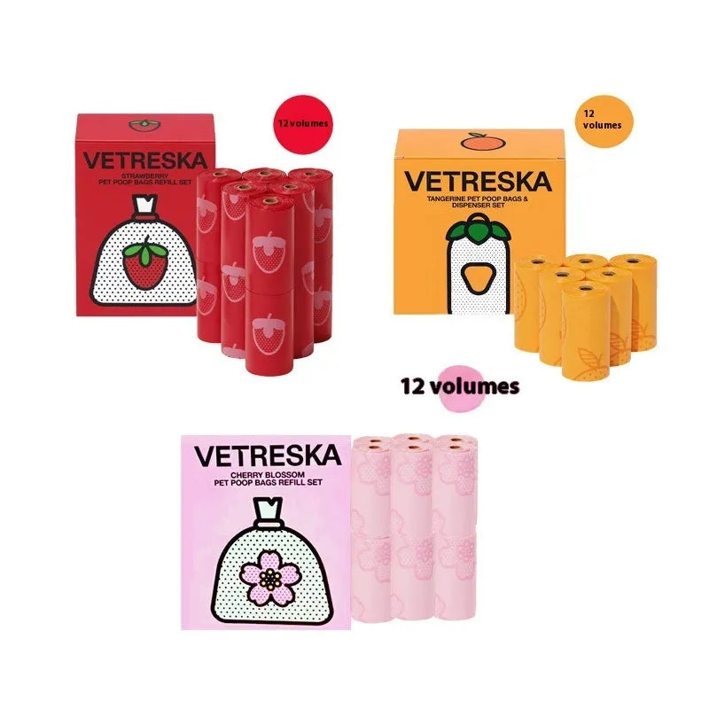 Colourful dog poo bag dispenser capsule with a roll of scented, biodegradable waste bags for dog walks