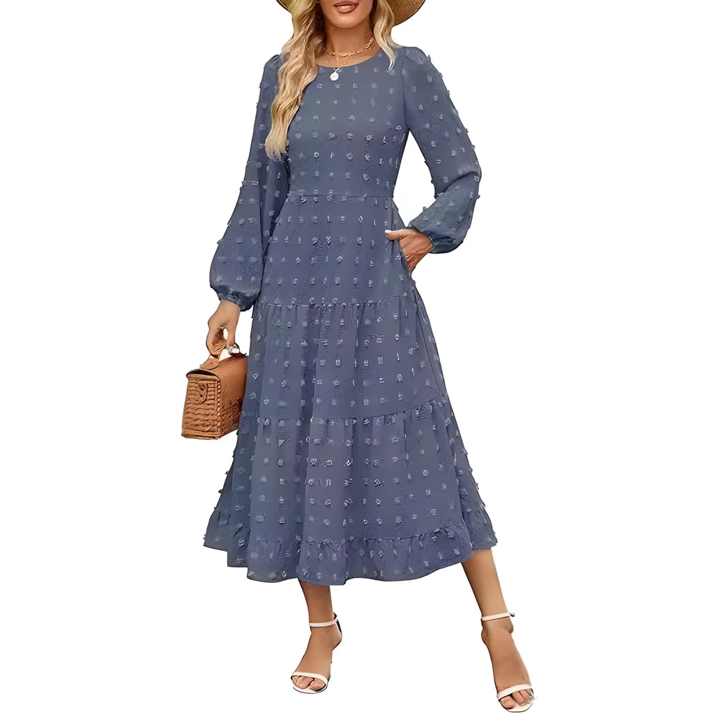 A beige high-waisted long sleeve dress with ruffled sleeves on a hanger.