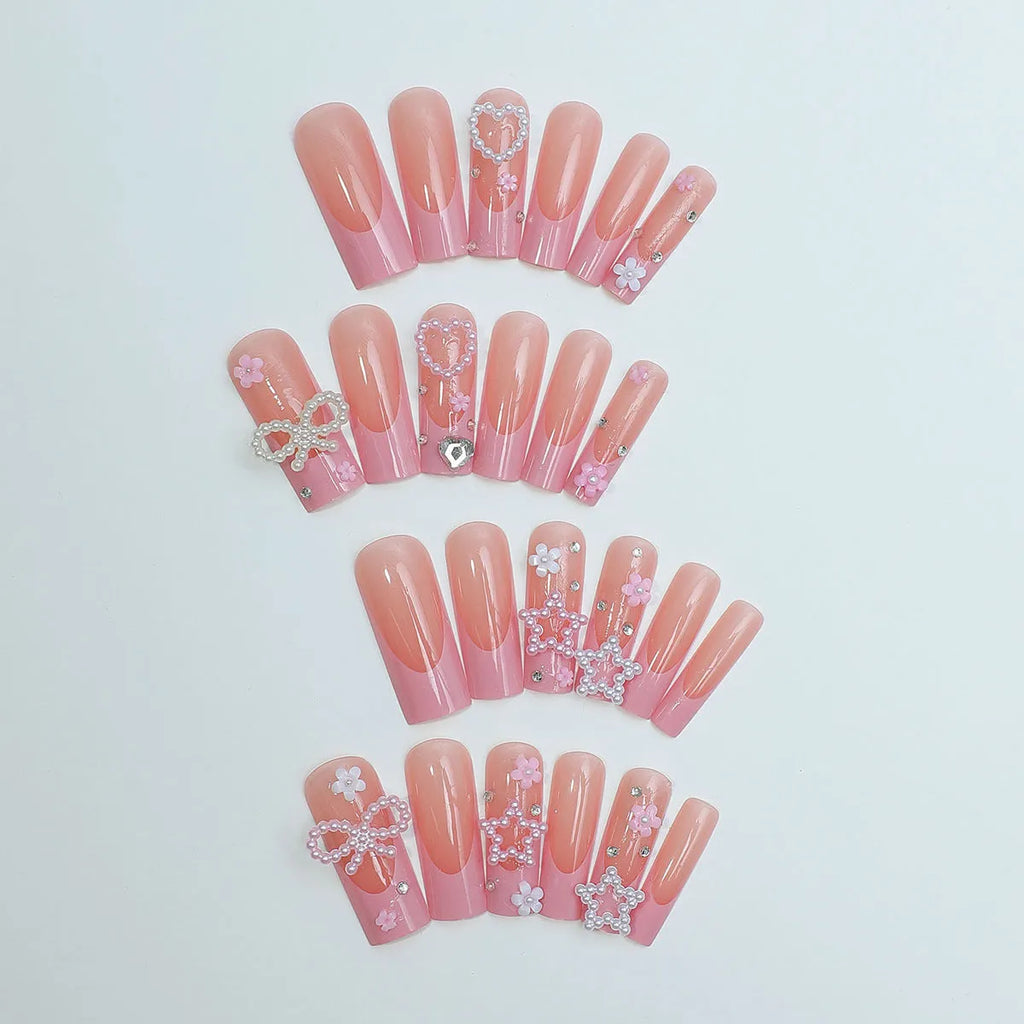 Super long artificial nails with French spot, bow detail, and love pattern in XB-70-48 colour.