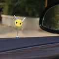 Swing Spring Bee car decoration with fur ball material and cartoon design measuring 3x3 cm