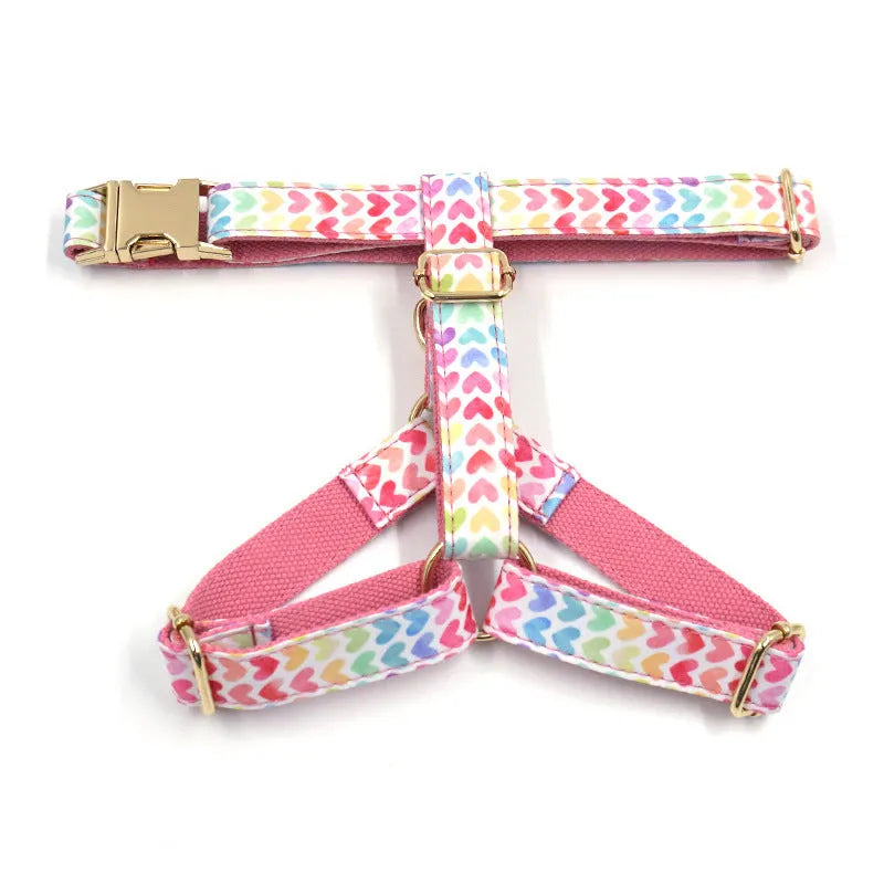 Pink colourful heart stone dog harness with gold buckle on a polyester chest and back strap.