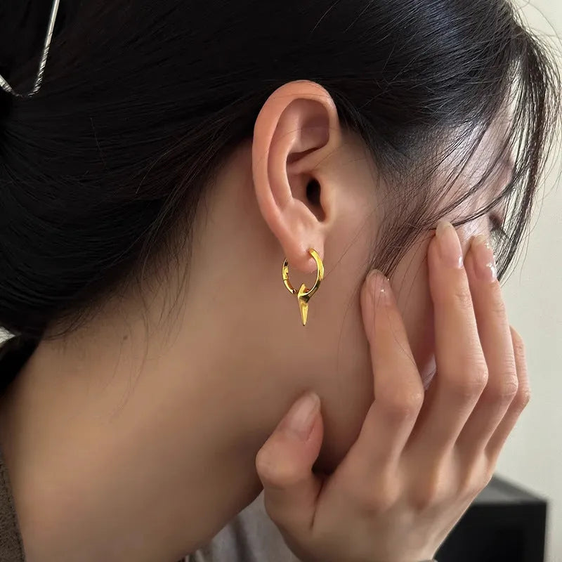 Geometric star-shaped ear clips for women with electroplated copper construction and metallic finish