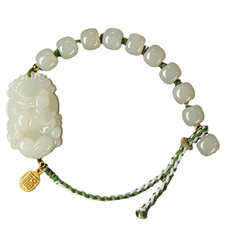 Hetian jade zodiac bracelet on red rope with S925 silver card for Chinese birth year animals.