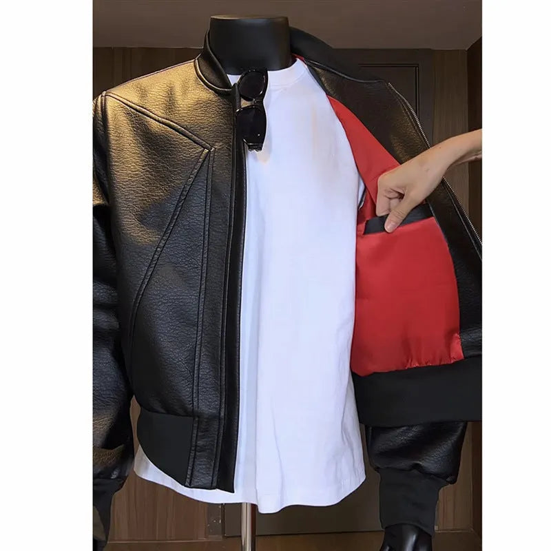 Men's extended length black PU leather jacket with egg white litchi grain texture and slim fit styling