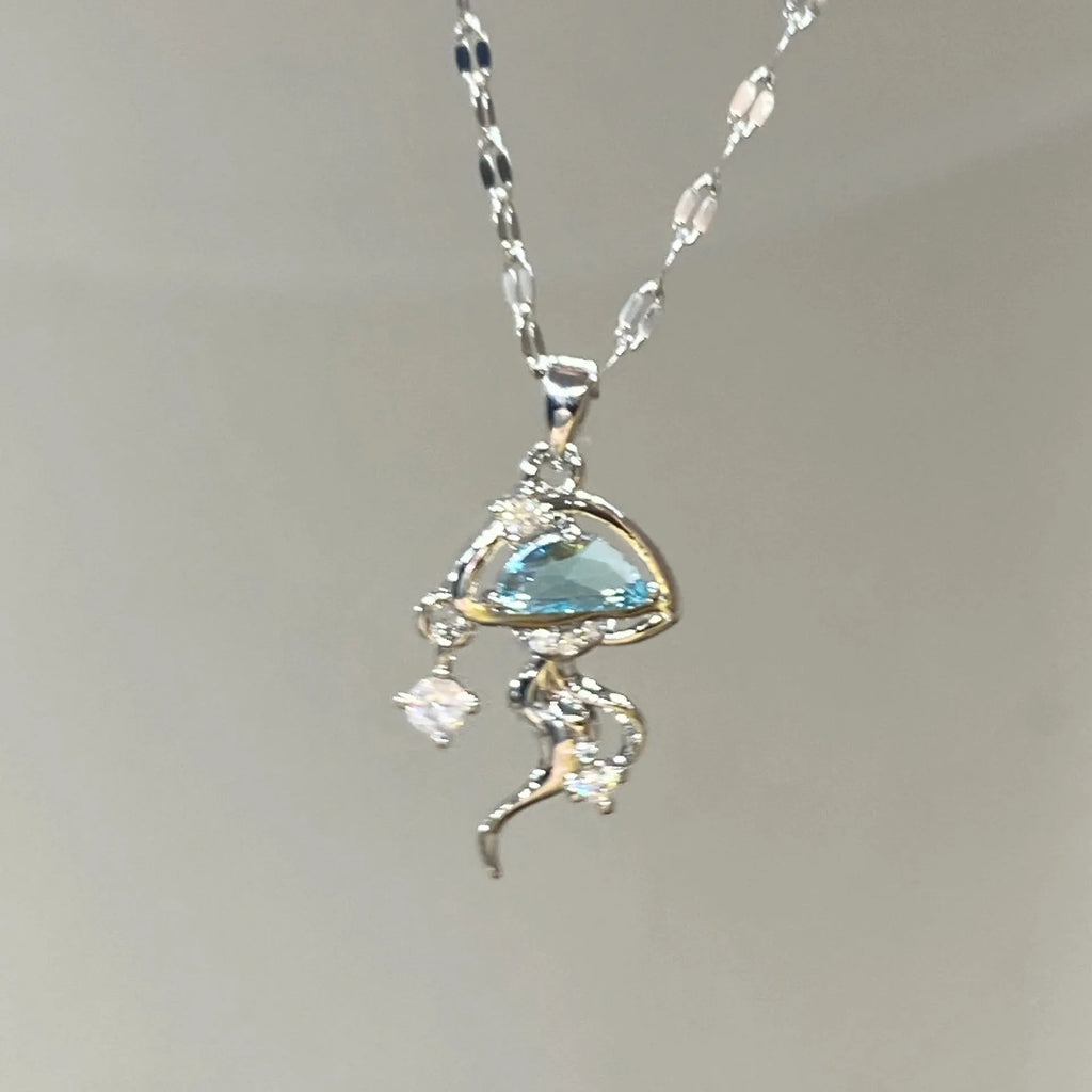 Sterling silver blue jellyfish necklace with white gold finish on adjustable chain