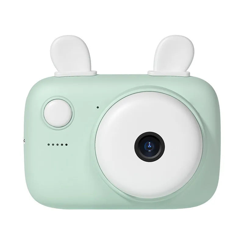 A2 Kids Macaron Mini SLR digital camera in pink, showing front and rear lenses and 2.4-inch screen.