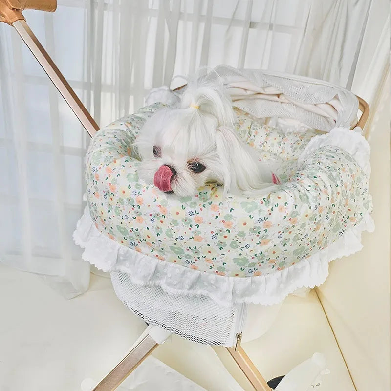 Removable washable pet stroller pad set showing towel, cushion, and pillow in a floral pattern.