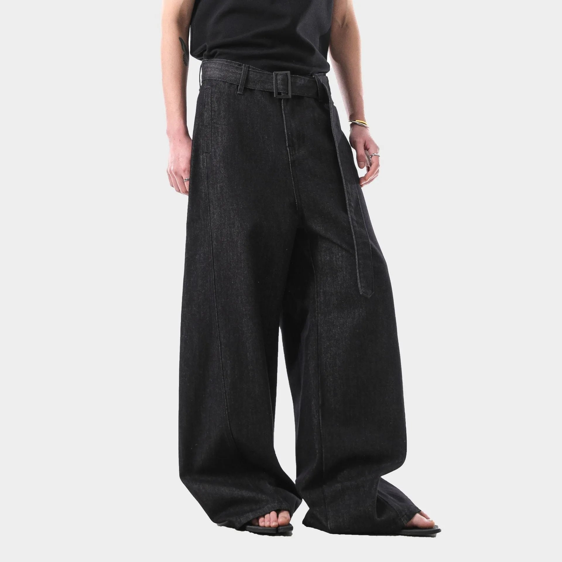 Women's black high-waist straight-leg jeans with retro gold wash detailing on denim.