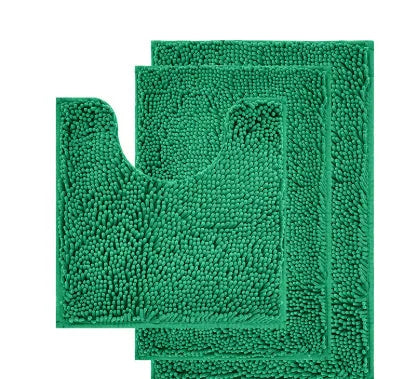 Chenille U-shaped three-piece bathroom carpet set in green beside a toilet.