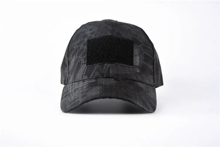 Cotton twill baseball cap with embroidered letters and Velcro fastening in black colour