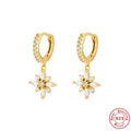 Sterling silver snowflake pendant earrings with gemstones in yellow or white gold plating.