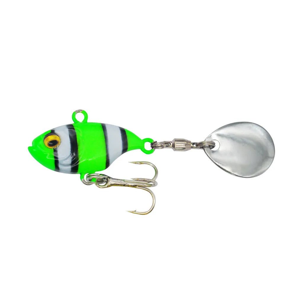 Metal sea fishing lure with a spinning sequin plate in gold colour with treble hook.