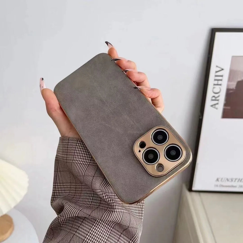 Leather texture grey TPU phone case fitted on an iPhone 14, showing textured back and slim profile.