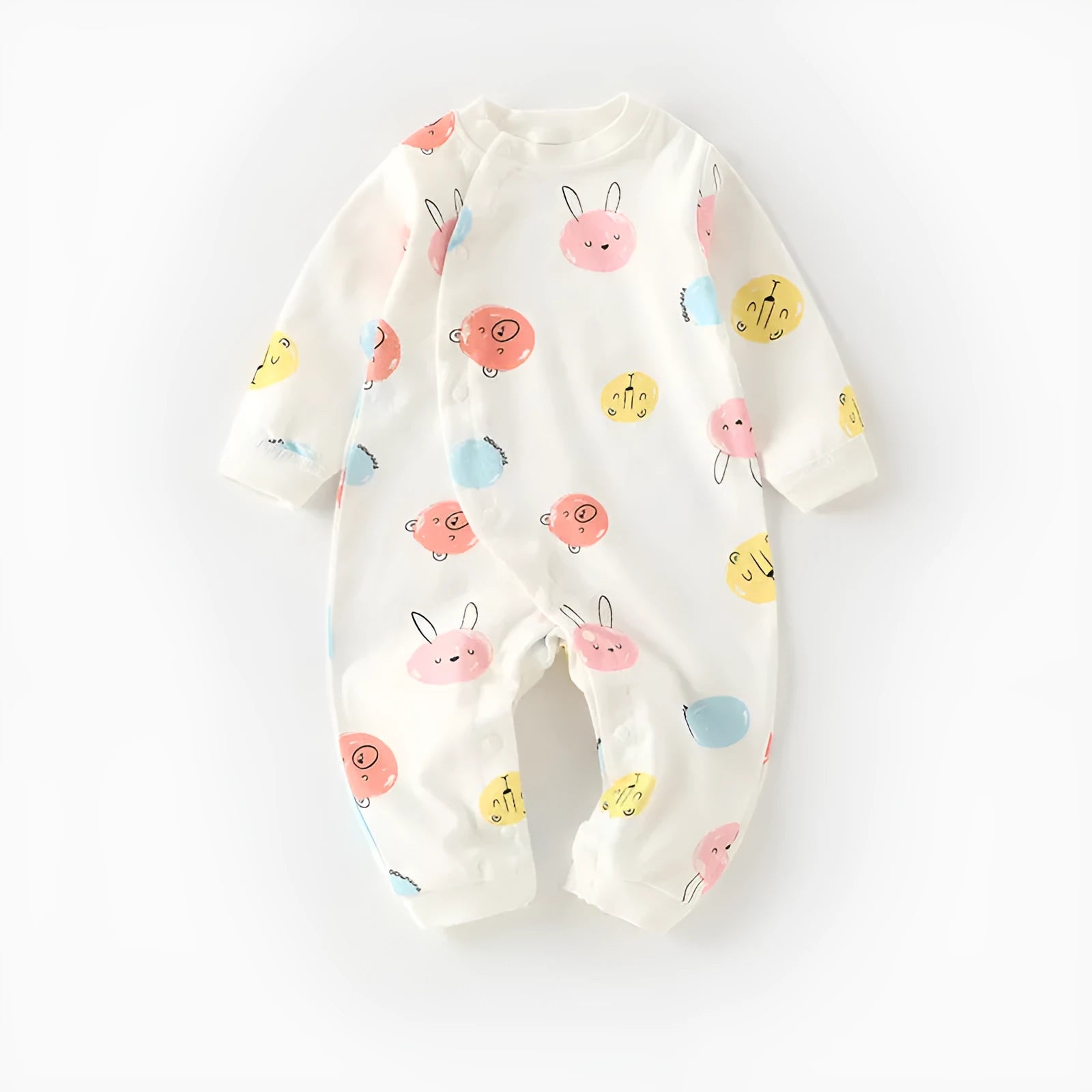 Cotton baby long climb pajamas in a colourful print, shown laid flat, suitable for spring and autumn.