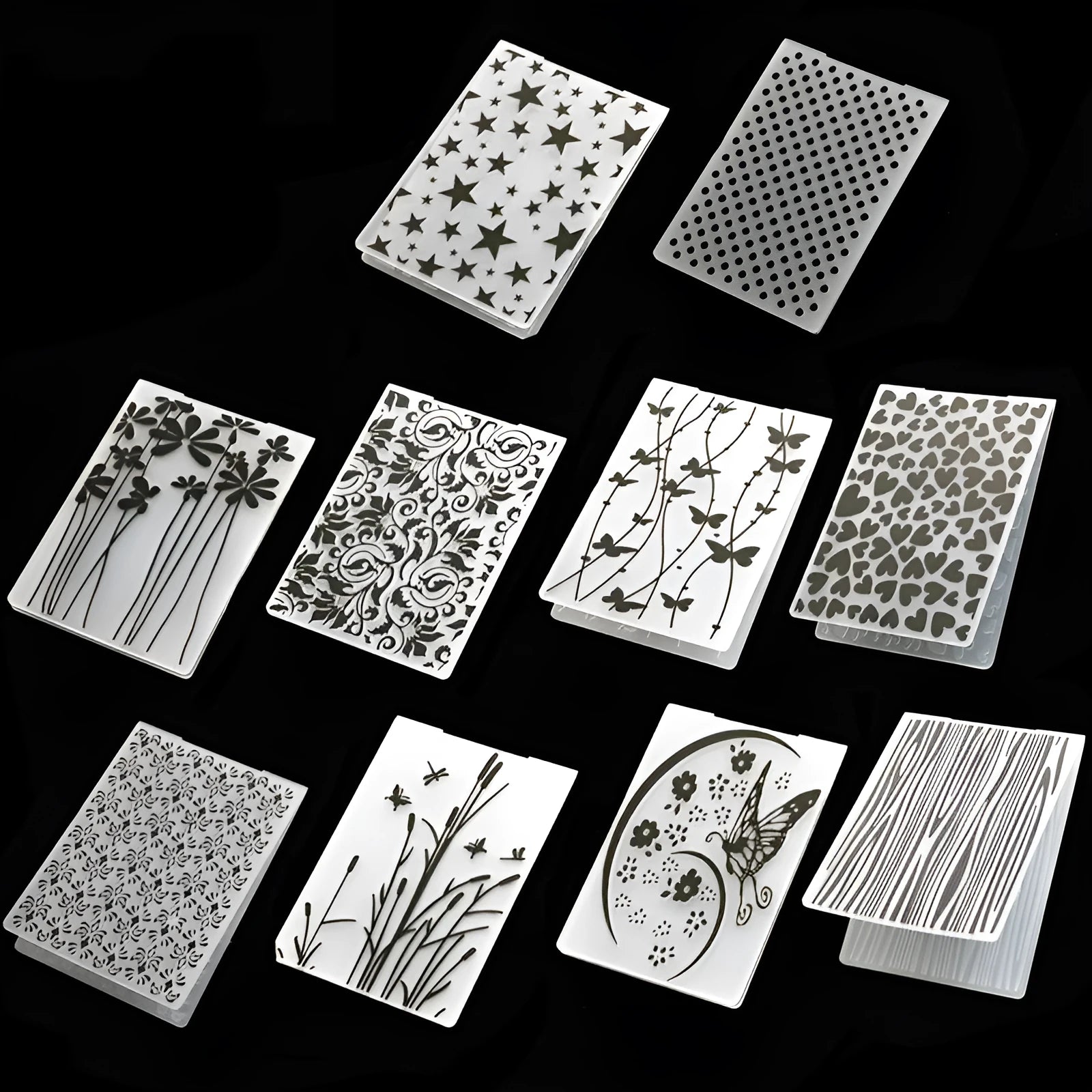 Plastic cake decorative mould showing windmill, flower, and star designs with dimensions 14.5 by 10.5 cm