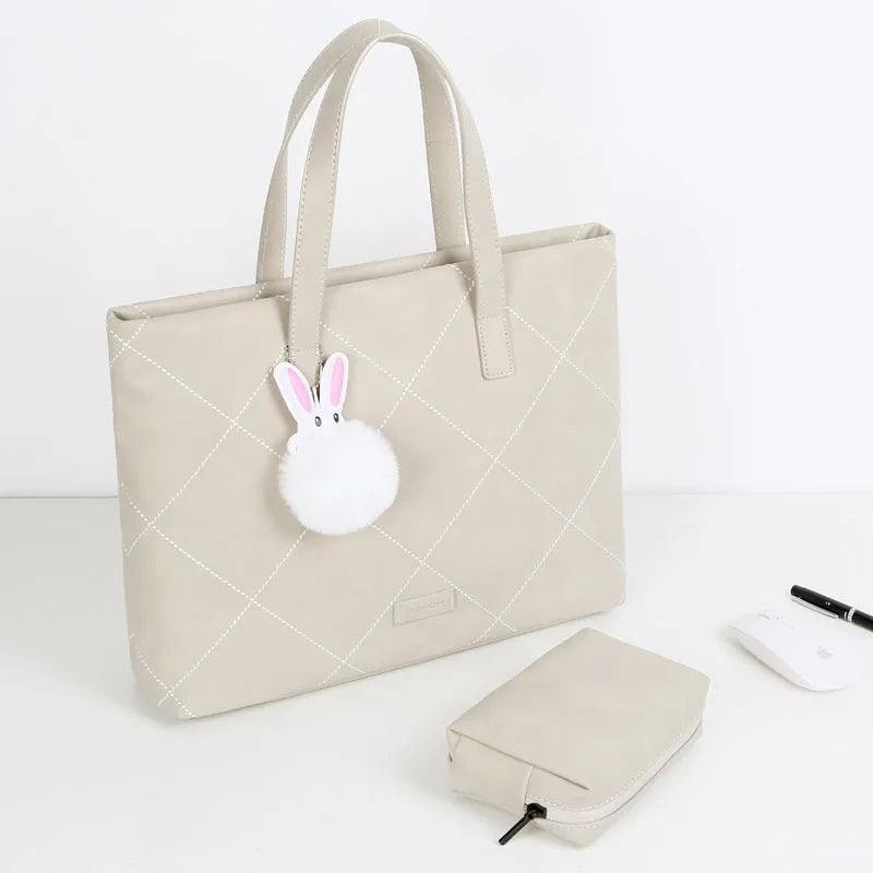 Crossbody genuine leather laptop bag in beige with nylon lining, fits 13 inch laptop